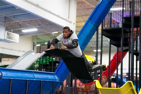 Slick city st. louis - Alayna Bowden, 15, of Maryland Heights rides the Bowl slide Nov. 26, 2022, at Slick City St. Louis West in Chesterfield. The slide starts with a steep drop then circles,